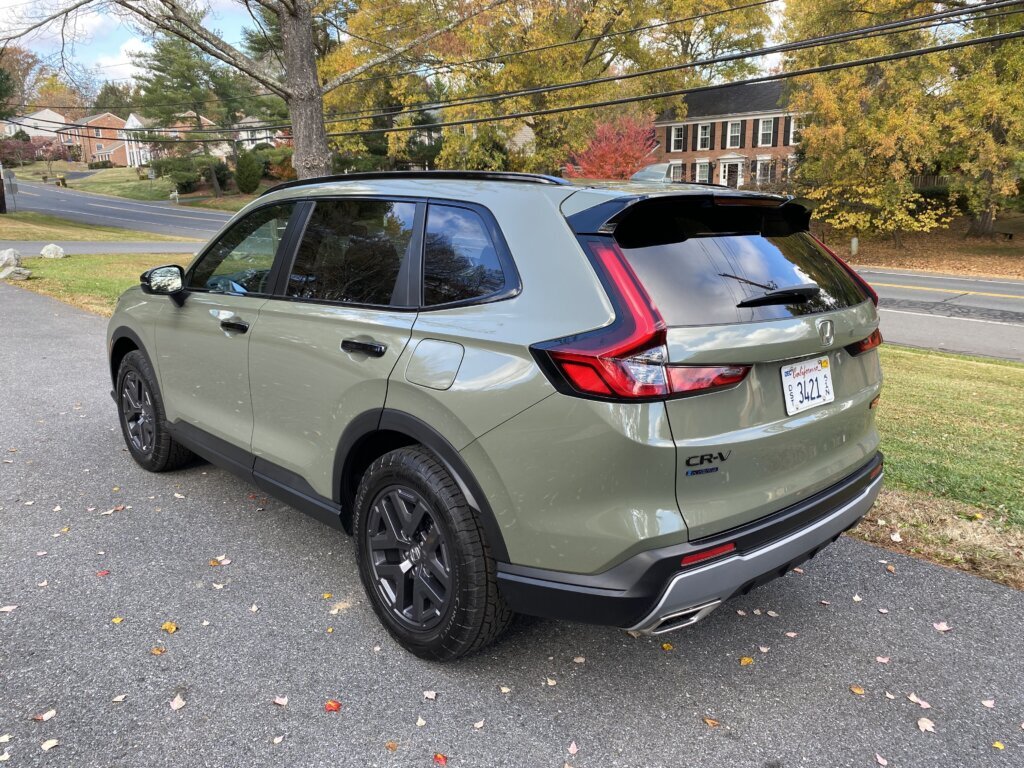 This CR-V's exterior is finished in a new ash green metallic color. It's complemented by chunky black wheels, which are wrapped in knobby all-terrain tires that still offer a smooth ride.