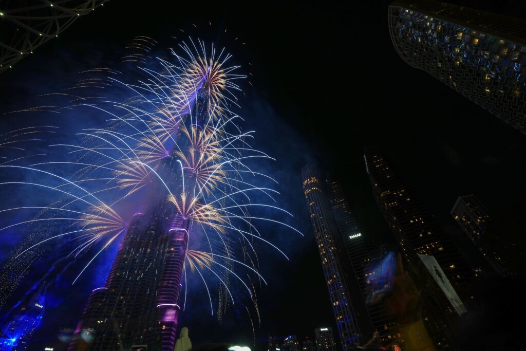 Fireworks explode around the Burj Khalifa, the world's tallest building, during New Year's Eve celebrations in Dubai, United Arab Emirates, Thursday, Jan. 1, 2026. (AP Photo/Fatima Shbair)