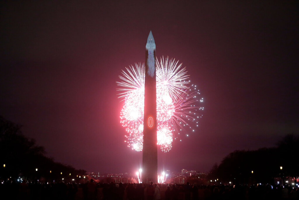 The Washington Monument is illuminated as a candle as part of the 250th anniversary celebration for the United States, Wednesday, Dec. 31, 2025, in Washington. (AP Photo/Rahmat Gul)