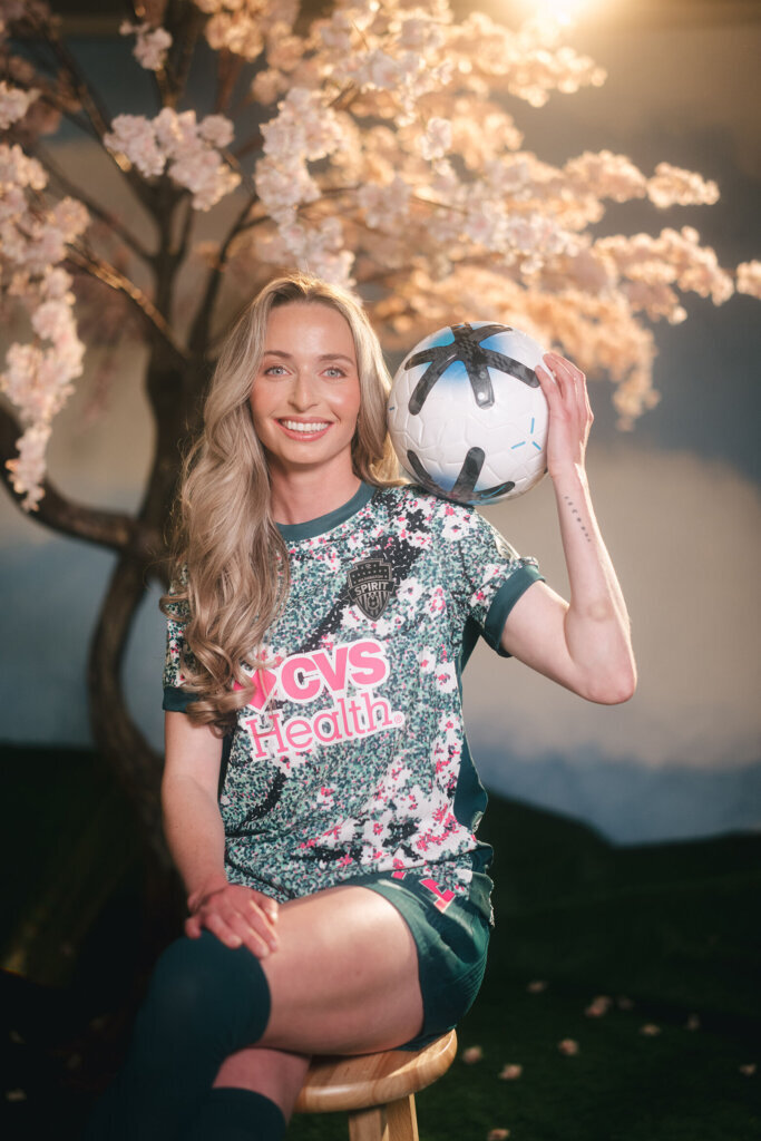 Defender Gabby Carle wears her new cherry blossom-themed jersey.