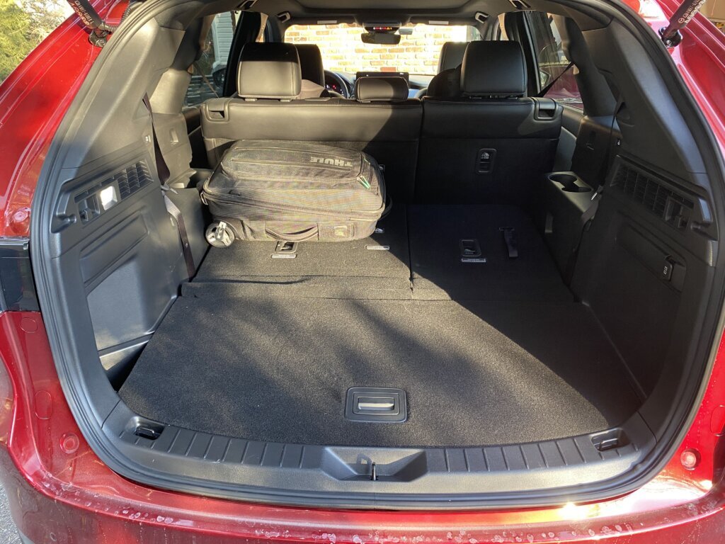 Fold it down and the CX‑90 becomes downright cavernous.