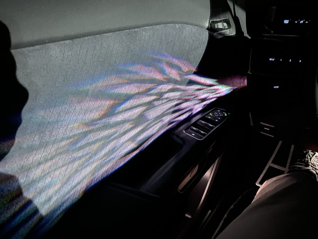 The interior door panels have a soft, flickering light projected onto them. Lexus says: "the faintly changing shadow patterns evoke the passage of time."