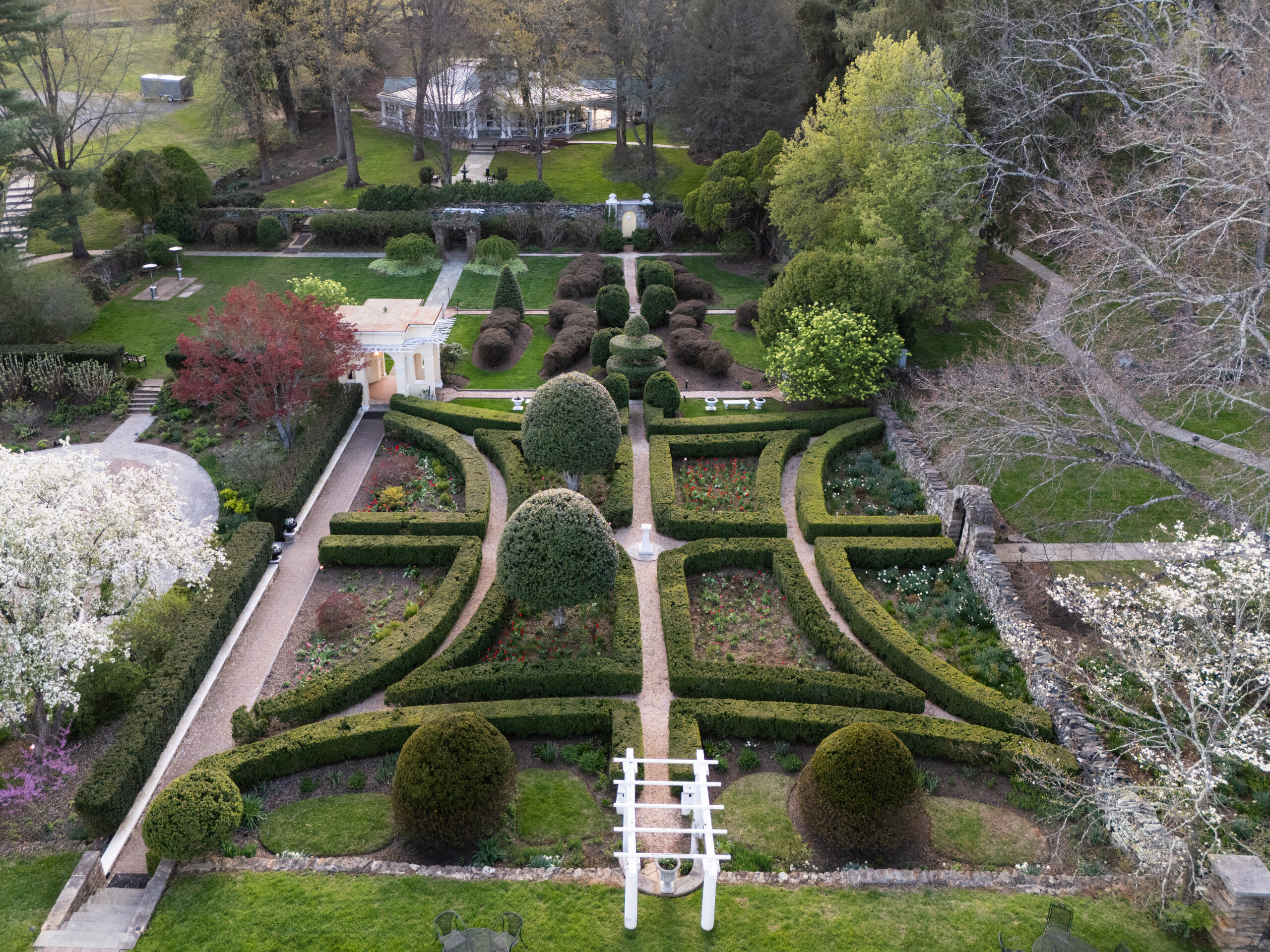 manicured gardens pictured from above by drone