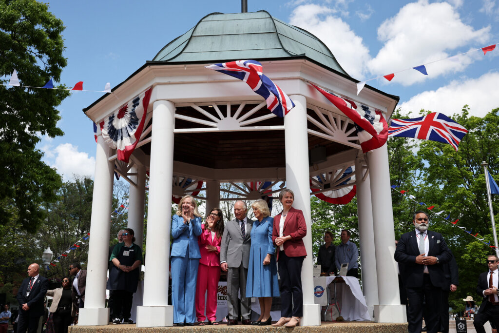 Left to right; Virginia Gov. Abigail Spanberger, Front Royal Mayor Lori A. Cockrell, Britain's King Charles III, Queen Camilla, and Secretary of State for Foreign and Commonwealth Affairs of the United Kingdom Yvette Cooper attend a parade and block party event Thursday, April 30, 2026, in Front Royal, Virginia. (Win McNamee/Pool Photo via AP)