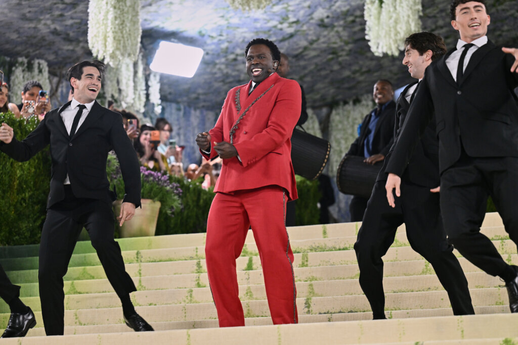 Joshua Henry, center, performs at The Metropolitan Museum of Art's Costume Institute benefit gala celebrating the opening of the "Costume Art" exhibition on Monday, May 4, 2026, in New York. (Photo by Evan Agostini/Invision/AP)