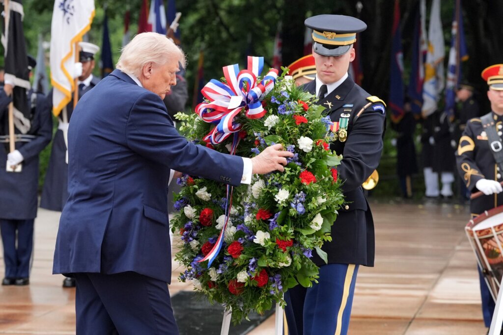 President Donald Trump places a wreath at the Tomb of the Unknown Soldier in Arlington National Cemetery on Memorial Day, Monday, May 25, 2026, in Arlington, Virginia. (AP Photo/Alex Brandon)