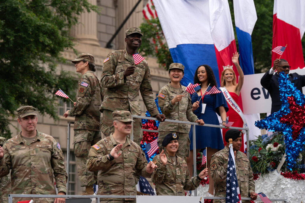 Parade participants march in Washington to commemorate Memorial Day, Monday, May 25, 2026, coinciding with the nation's 250th anniversary celebrations. (AP Photo/Jose Luis Magana)